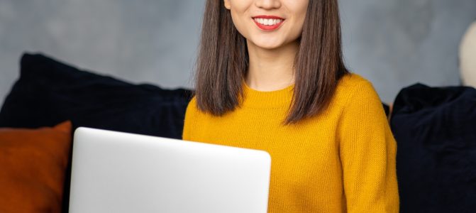 asian-business-woman-working-in-laptop-on-sofa-ja-2022-11-15-22-14-30-utc